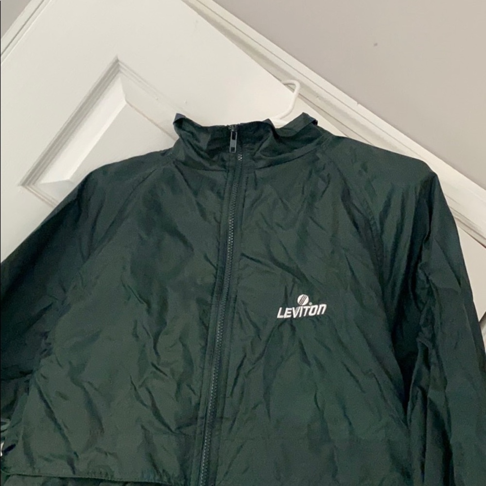 green windbreaker